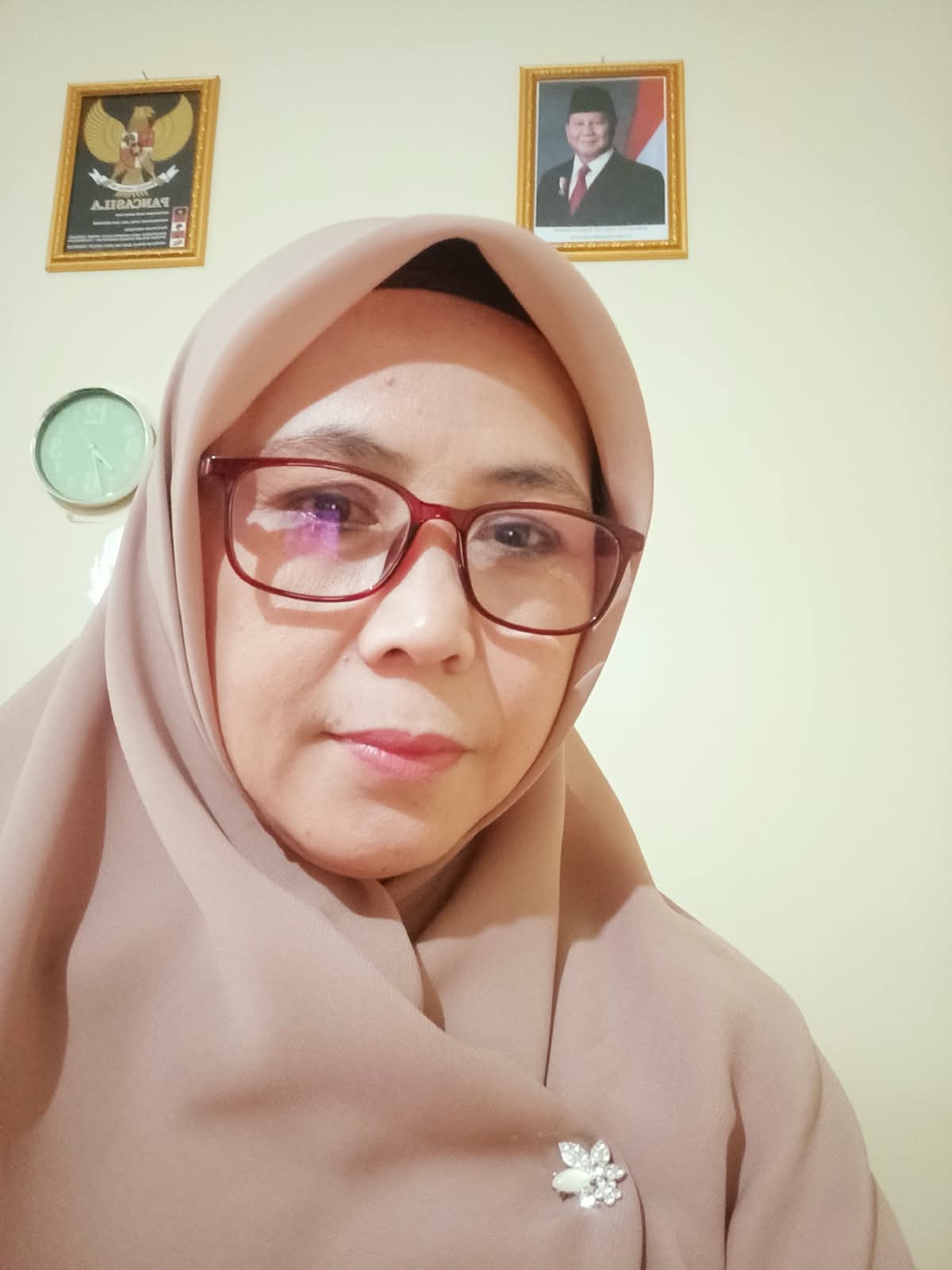 Rina Rosmayana, S.Pd.I, M.Pd.